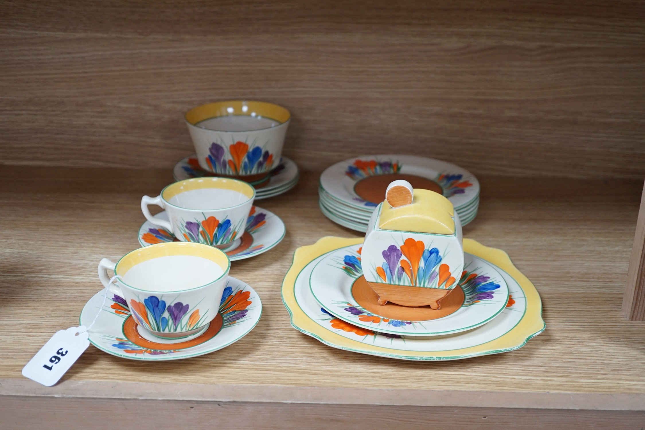 A Clarice Cliff seventeen piece Autumn Crocus part teaset, including a preserve jar and cover